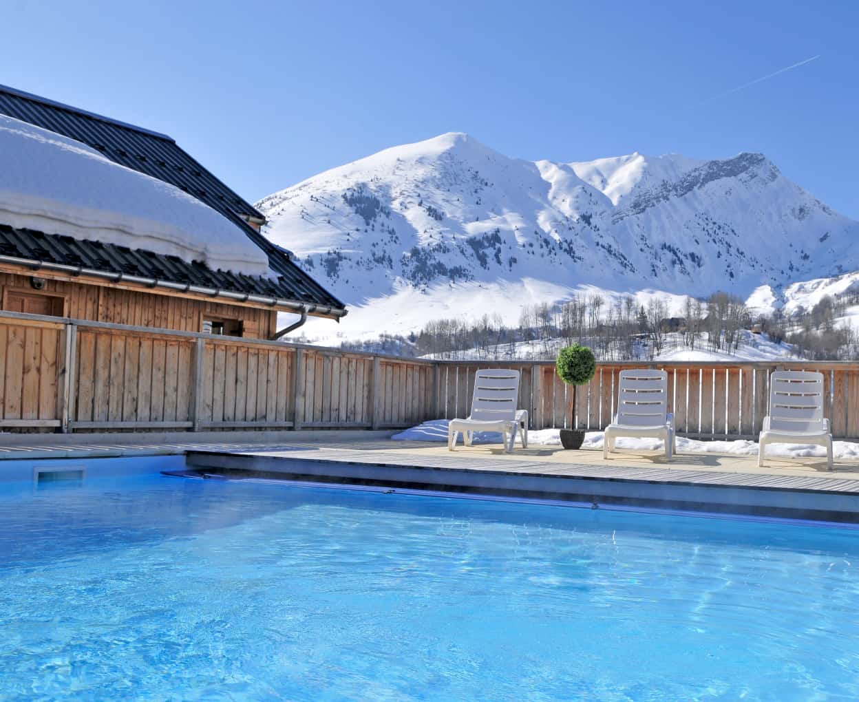 Résidence de vacances avec piscine chauffée à la montagne