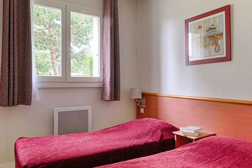 Exemple de chambre au sein de la résidence de vacances Goélia green Panorama à Cabourg en Normandie