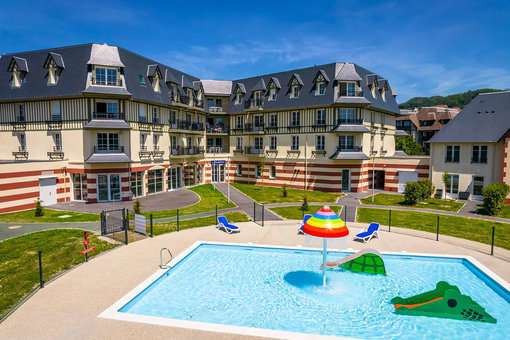 Outdoor, fun, heated children's pool at the Goélia Tourist Residence in Blonville-sur-Mer