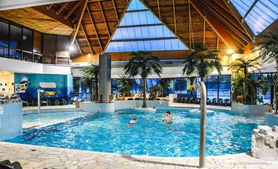 Complexe aquatique intérieur de la résidence de vacances Goélia La Pommeraie à Branville en Normandie Complexe aquatique intérieur de la résidence de vacances Goélia La Pommeraie à Branville en Normandie