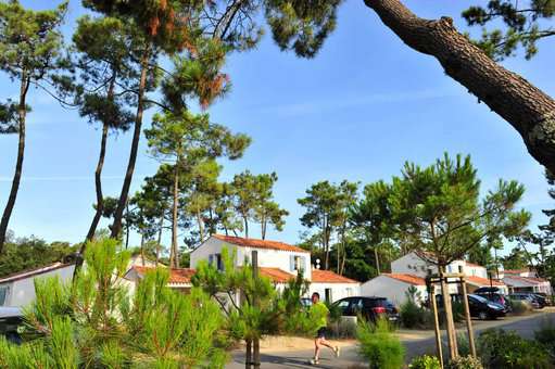 Exterior of the holiday residence Goélia Le Domaine des Oyats in the pine forest in Longeville-sur-Mer