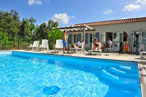 Heated private pool of a villa of the holiday residence Goélia Le Domaine des Oyats in Longeville-sur-Mer