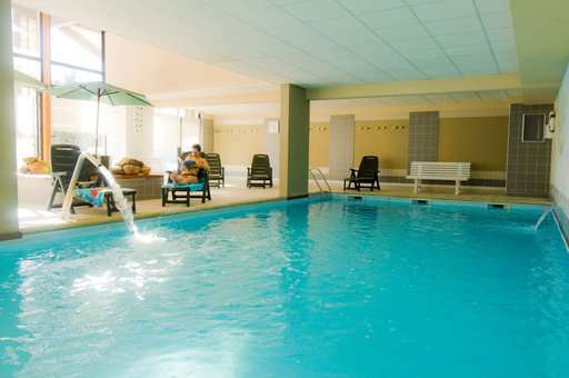 Heated indoor swimming pool of the holiday residence Goélia Le Domaine de Castella in Font-Romeu