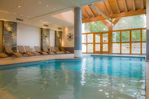 Indoor heated swimming pool at Les Chalets de Wengen holiday residence in Montchavin-la-Plagne, in the Northern Alps