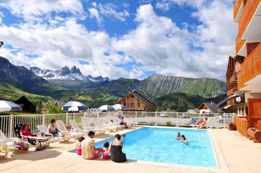 Heated outdoor swimming pool at the Le Relais des Pistes holiday residence in Albiez-Montrond, in the Northern Alps