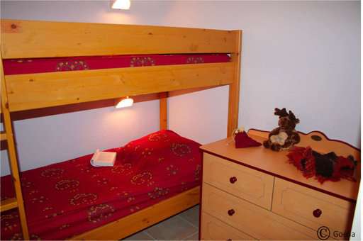 Example of a sleeping area with bunk beds in the Les Flocons d'Argent holiday residence in Aussois, in the Northern Alps