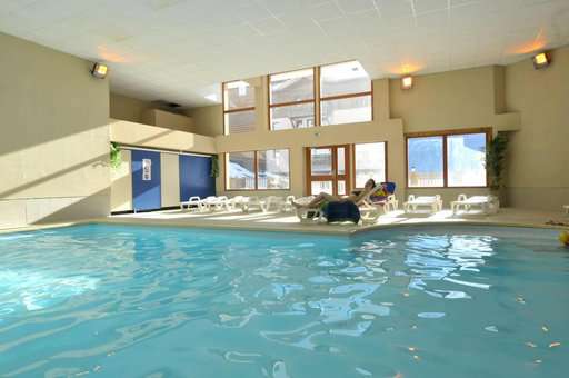 Indoor heated swimming pool at Les Flocons d'Argent holiday residence in Aussois, in the Northern Alps