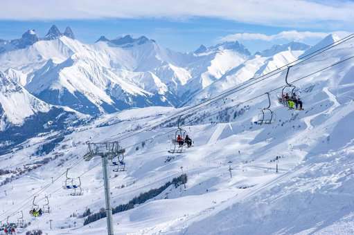 Slopes and lifts of the ski resort of St Colomban Les Sybelles in the Alps