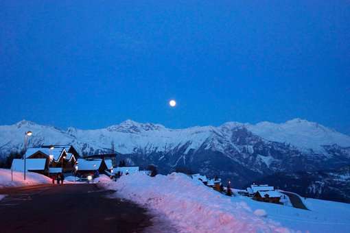 Ski resort of St Colomban Les Sybelles in the Alps at night