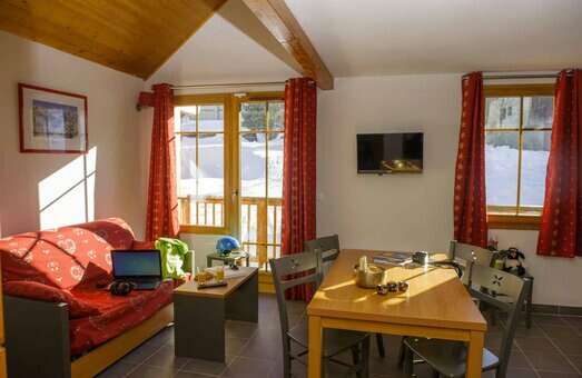 Example of a living room in the vacation residence Goélia Les Chalets de Belledonne in St Colomban Les Sybelles