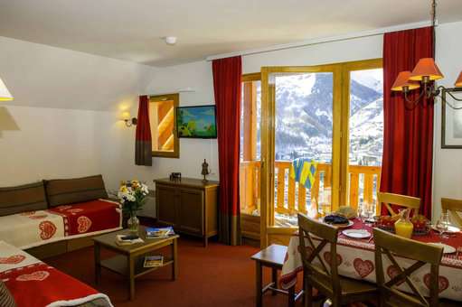 Example of a living room in the vacation residence Goélia Les Chalets de Valoria in Valloire