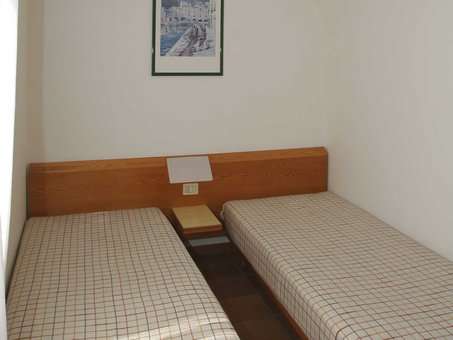 Exemple de chambre de la résidence de vacances San Carlo à Costermano, proche du Lac de Garde, en Italie
