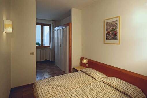 Exemple de chambre de la résidence de vacances San Carlo à Costermano, proche du Lac de Garde, en Italie