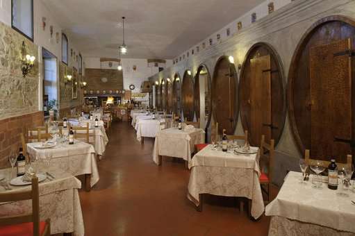 Restaurant de la résidence de vacances Fattoria Degli Usignoli à San Donato in Fronzano, en Toscane, en Italie