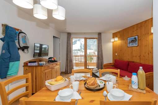Exemple de salon de la résidence de vacances Goélia le Blanchot à Pralognan la Vanoise dans les Alpes du Nord
