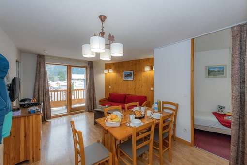 Exemple de salon de la résidence de vacances Goélia Le Blanchot à Pralognan La Vanoise dans les Alpes du Nord