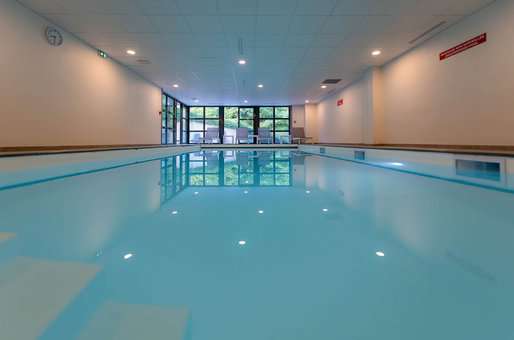 Indoor swimming pool at the Goélia Le Domaine du Golf holiday residence in Ammerschwihr / Colmar