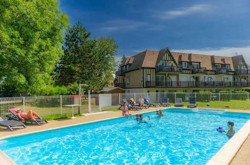 Heated outdoor swimming pool at the holiday residence Goélia Green Panorama in Cabourg