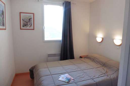 Exemple de chambre d'un appartement 2 pièces 4 personnes de la résidence de vacances Les Balcons du Soleil à Peyragudes dans les Pyrénées