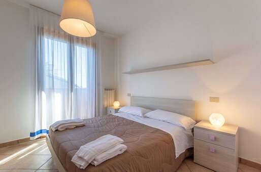 Exemple de chambre d'un V3 de la résidence de vacances Albarella en Italie