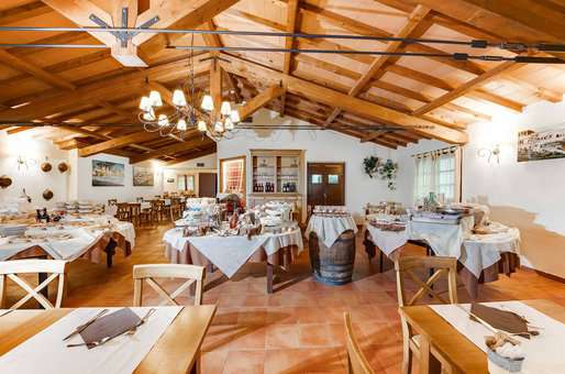 Restaurant de la résidence de vacances Borgo Magliano Garden Resort en Toscane, en Italie