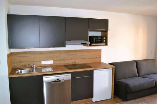 Exemple de kitchenette de la résidence Arya Living Stone à Vars dans les Alpes du Sud