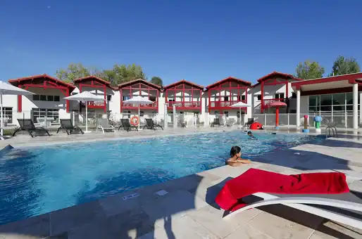 Heated outdoor swimming pool  at the Goélia Le Domaine d'Uhaina holiday residence in Urrugne in the Basque Country