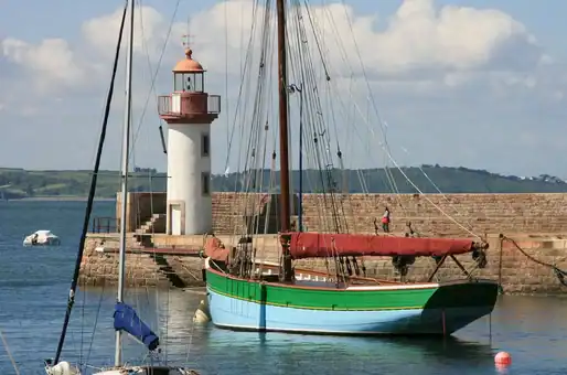 Passage through the port of Erquy with its lighthouse near the Goélia residence Locmaria Plouzané