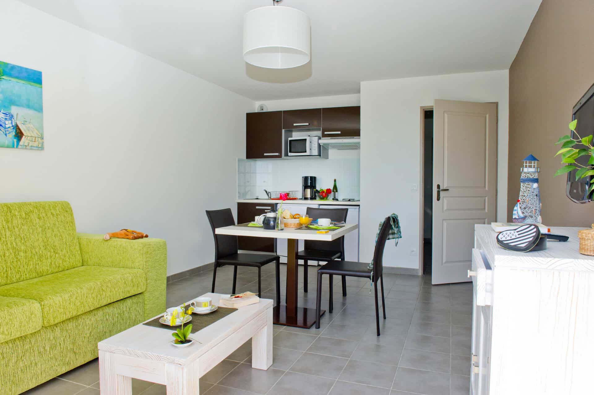 Exemple de salon d'un appartement de la résidence de vacances Goélia An Douar à Audierne Exemple de salon d'un appartement de la résidence de vacances Goélia An Douar à Audierne