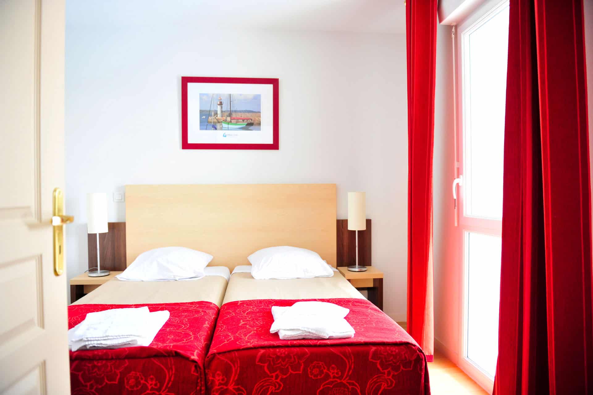 Chambre avec 2 lits twins d'un appartement de la résidence de vacances Goélia La Grande Plage à St-Gilles-Croix-de-Vie Chambre avec 2 lits twins d'un appartement de la résidence de vacances Goélia La Grande Plage à St-Gilles-Croix-de-Vie