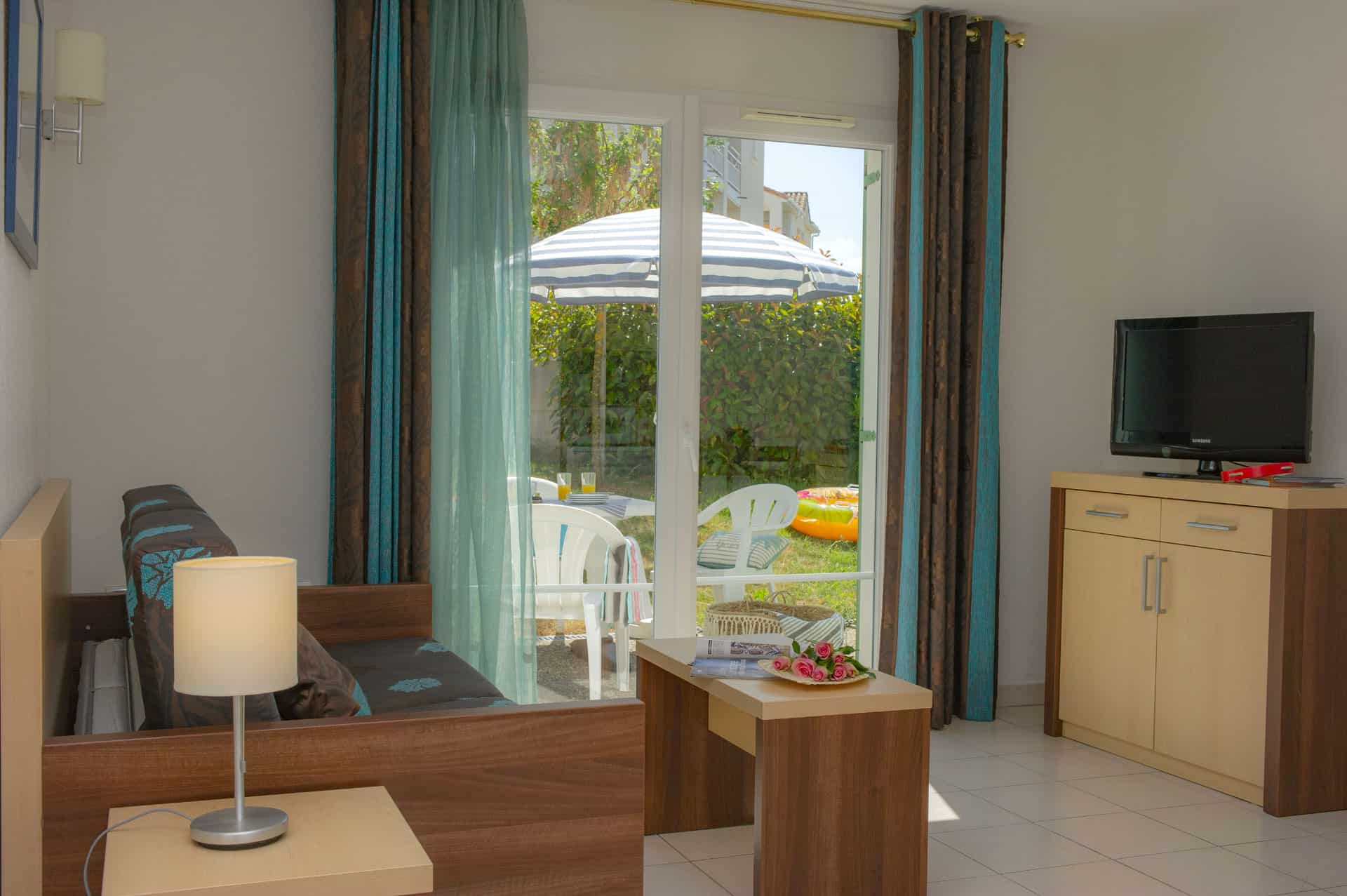 Salon d'un logement de la résidence de vacances Goélia La Grande Plage à St-Gilles-Croix-de-Vie Salon d'un logement de la résidence de vacances Goélia La Grande Plage à St-Gilles-Croix-de-Vie