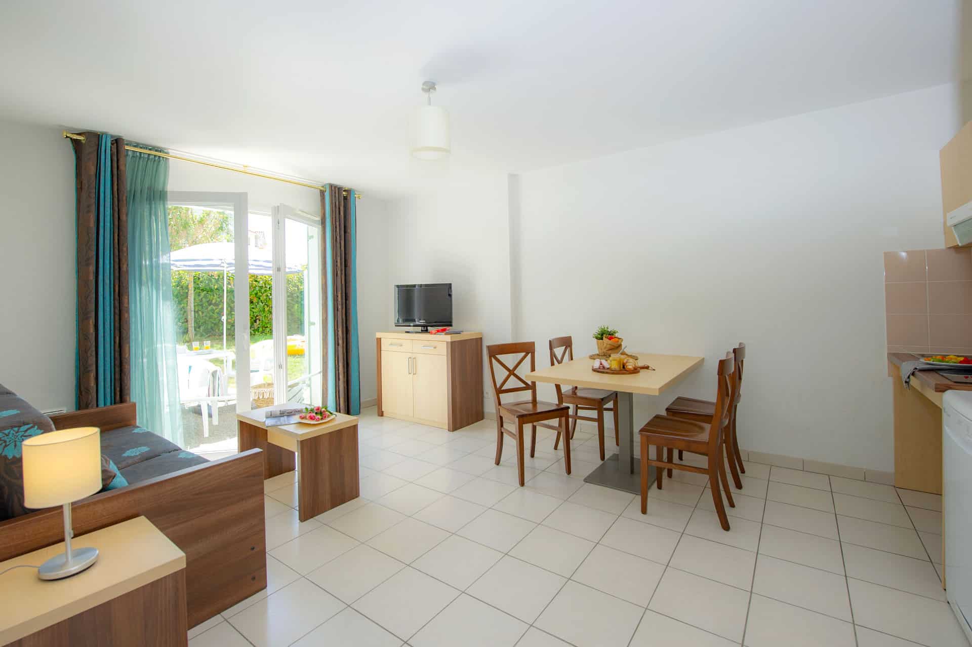 Salon d'un logement de la résidence de vacances Goélia La Grande Plage à St-Gilles-Croix-de-Vie Salon d'un logement de la résidence de vacances Goélia La Grande Plage à St-Gilles-Croix-de-Vie