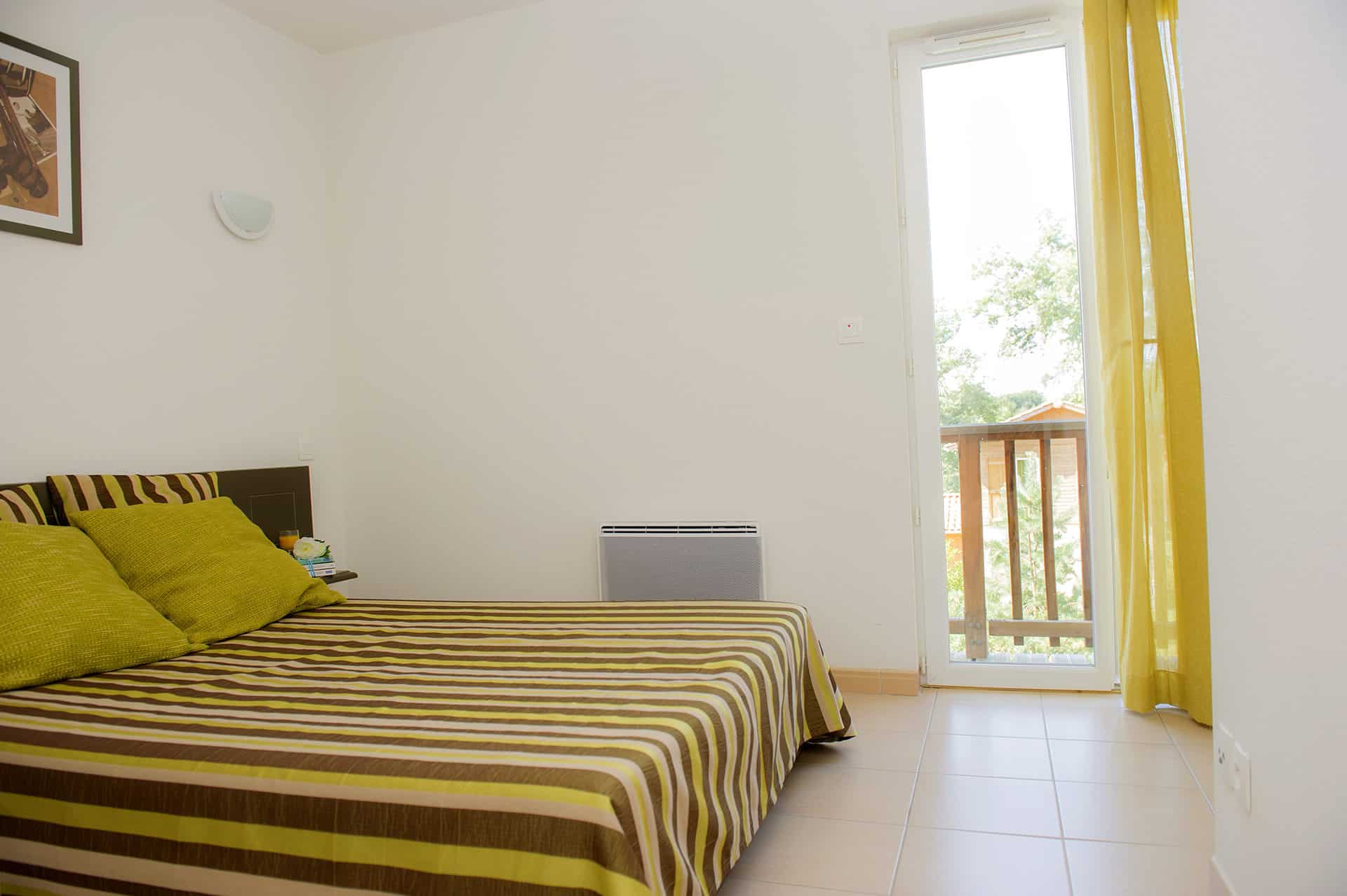 Exemple de chambre de la résidence de vacances Les Maisons du Golf d'Armagnac à Eauze  Exemple de chambre de la résidence de vacances Les Maisons du Golf d'Armagnac à Eauze
