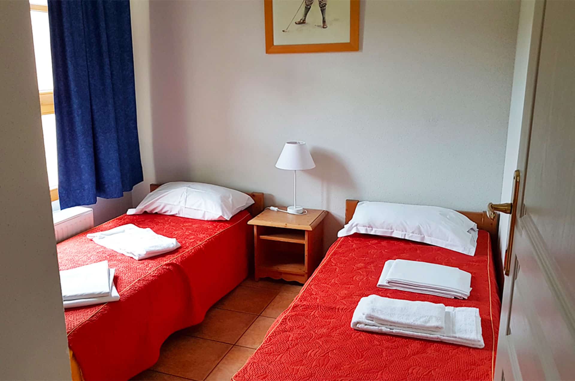 Chambre avec 2 lits twins d'un appartement de la résidence de vacances Goélia Le Domaine du Golf à Ammerschwihr / Colmar Chambre avec 2 lits twins d'un appartement de la résidence de vacances Goélia Le Domaine du Golf à Ammerschwihr / Colmar