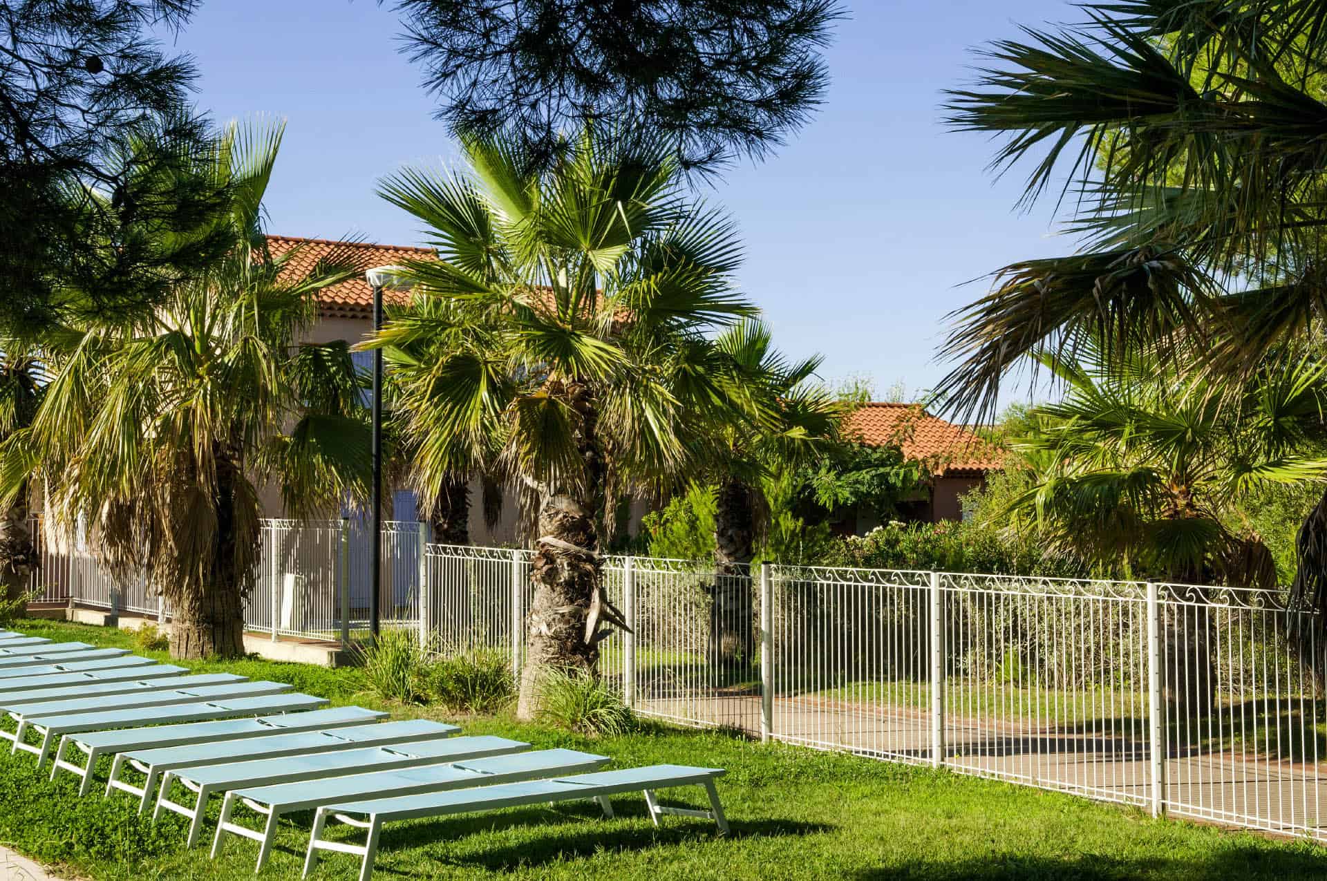 Pool deck chairs at the Goélia Cap Bleu holiday home in Carro Pool deck chairs at the Goélia Cap Bleu holiday home in Carro