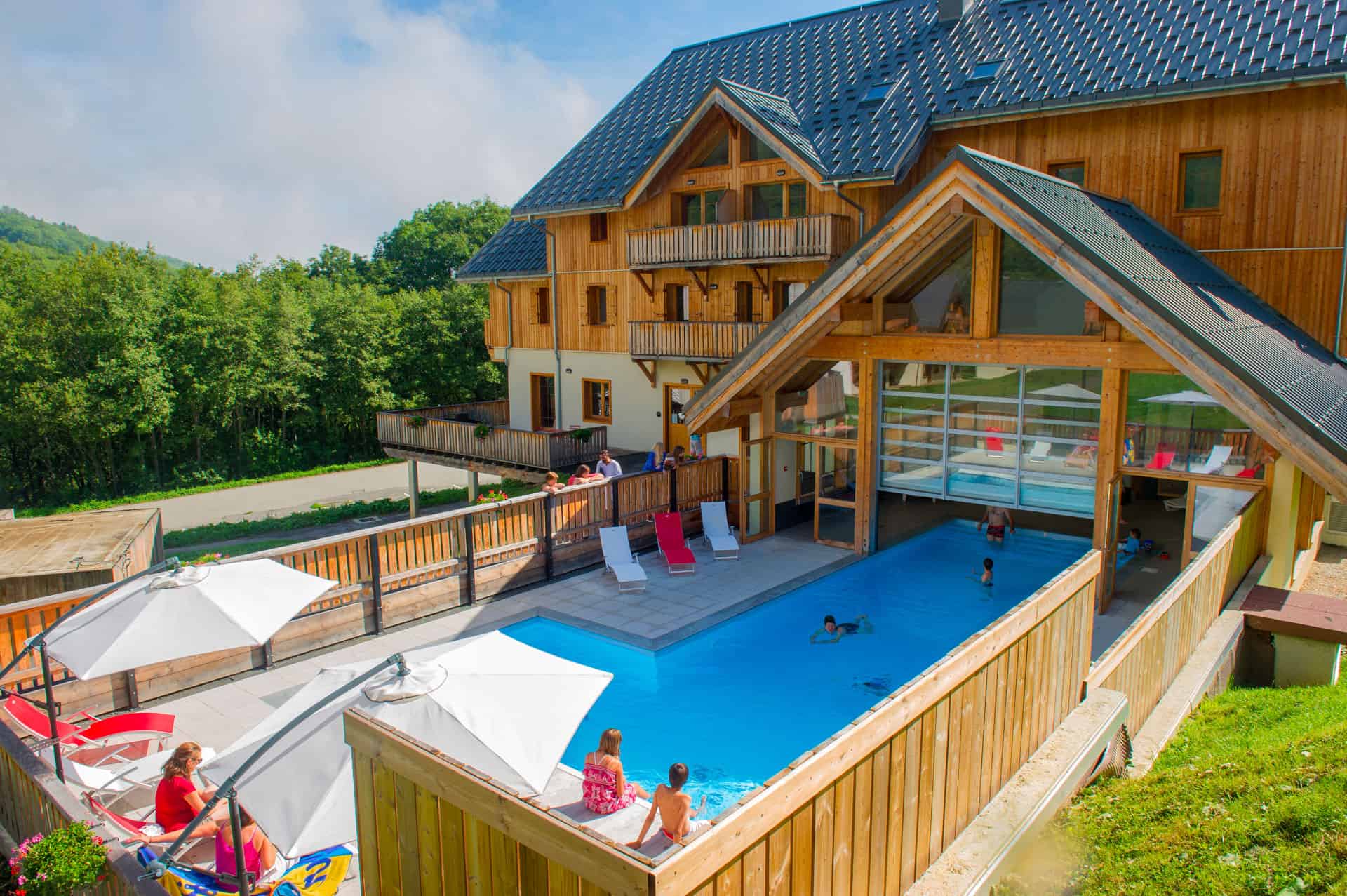 Exterior interior heated pool on the vacation residence Goélia Les Chalets de Belledonne in St Colomban Les Sybelles Exterior interior heated pool on the vacation residence Goélia Les Chalets de Belledonne in St Colomban Les Sybelles