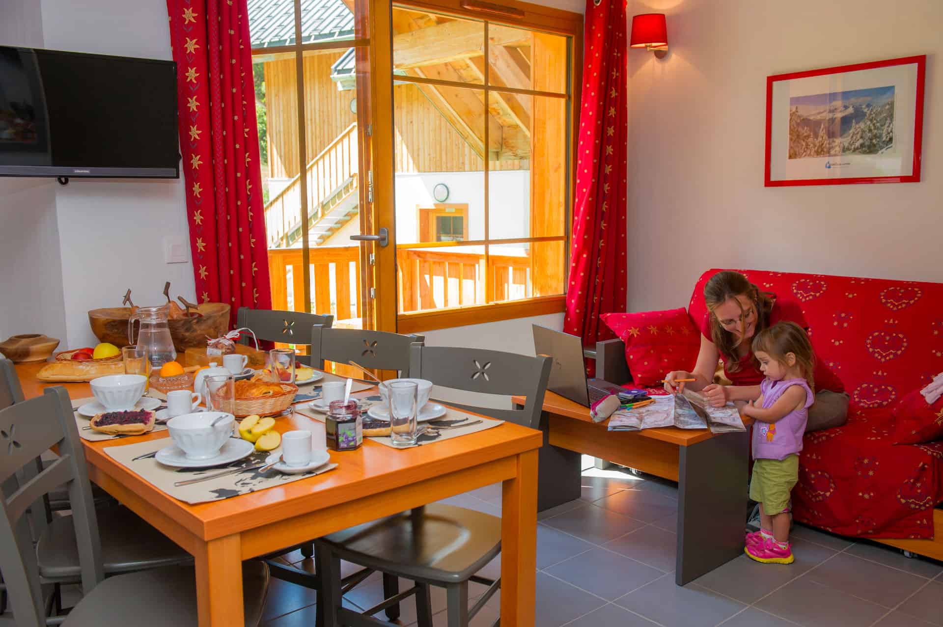 Example of a living room in the vacation residence Goélia Les Chalets de Belledonne in St Colomban Les Sybelles Example of a living room in the vacation residence Goélia Les Chalets de Belledonne in St Colomban Les Sybelles