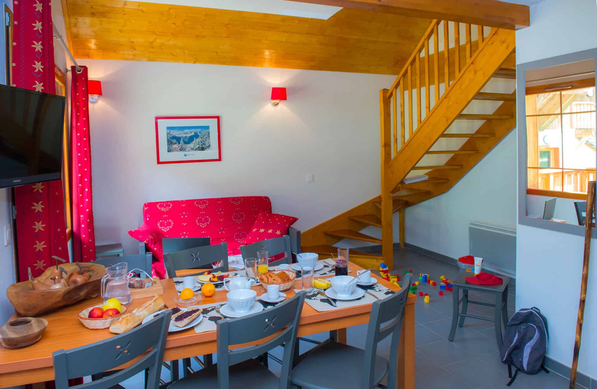 Example of a living room in the vacation residence Goélia Les Chalets de Belledonne in St Colomban Les Sybelles Example of a living room in the vacation residence Goélia Les Chalets de Belledonne in St Colomban Les Sybelles