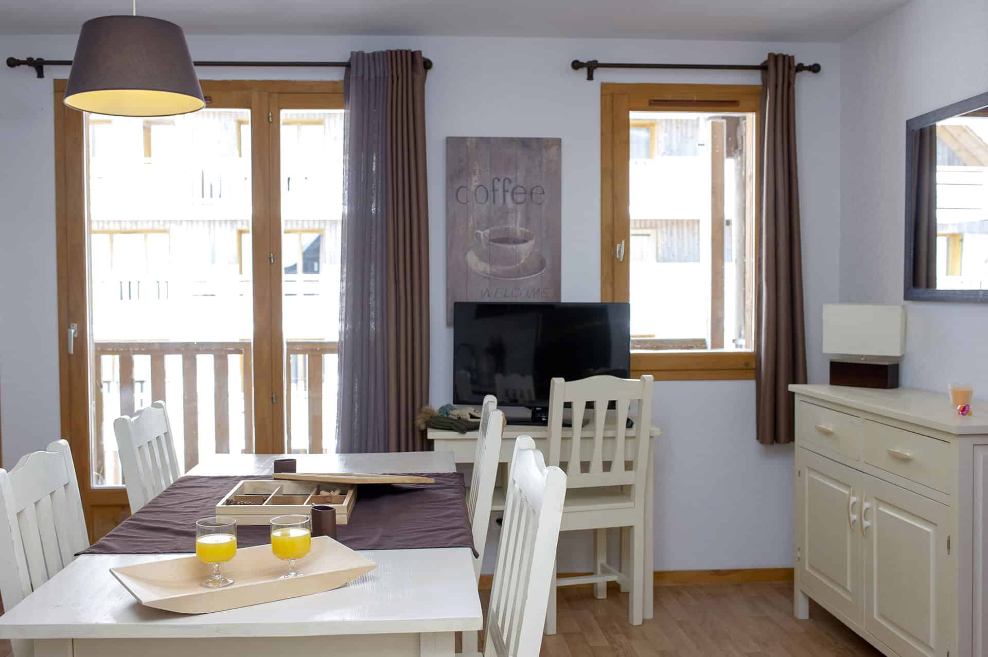 Example of living room of the residence of vacation Goélia Les Chalets de Super-Besse in the Massif Central Example of living room of the residence of vacation Goélia Les Chalets de Super-Besse in the Massif Central
