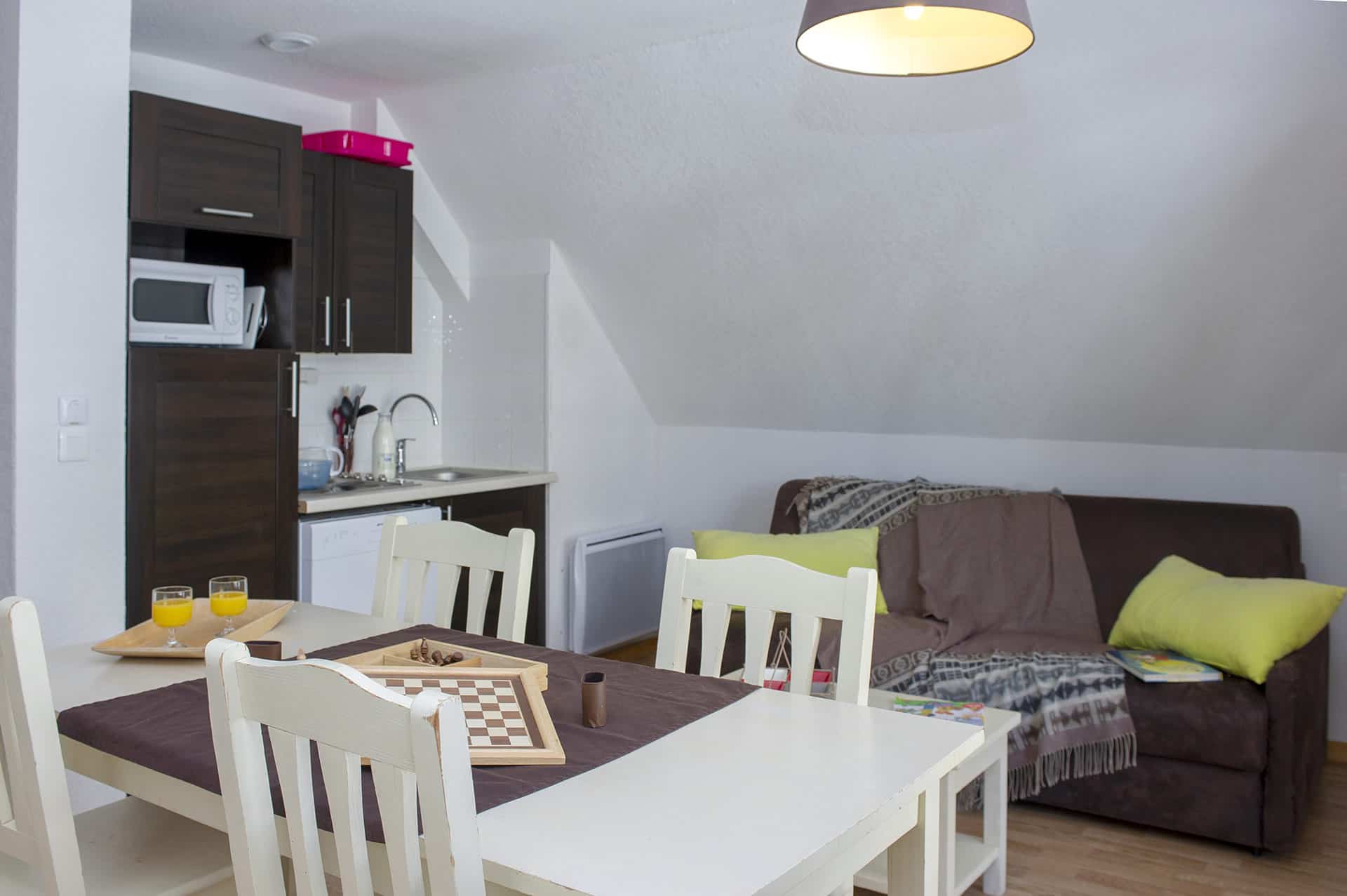 Example of living room of the residence of vacation Goélia Les Chalets de Super-Besse in the Massif Central Example of living room of the residence of vacation Goélia Les Chalets de Super-Besse in the Massif Central