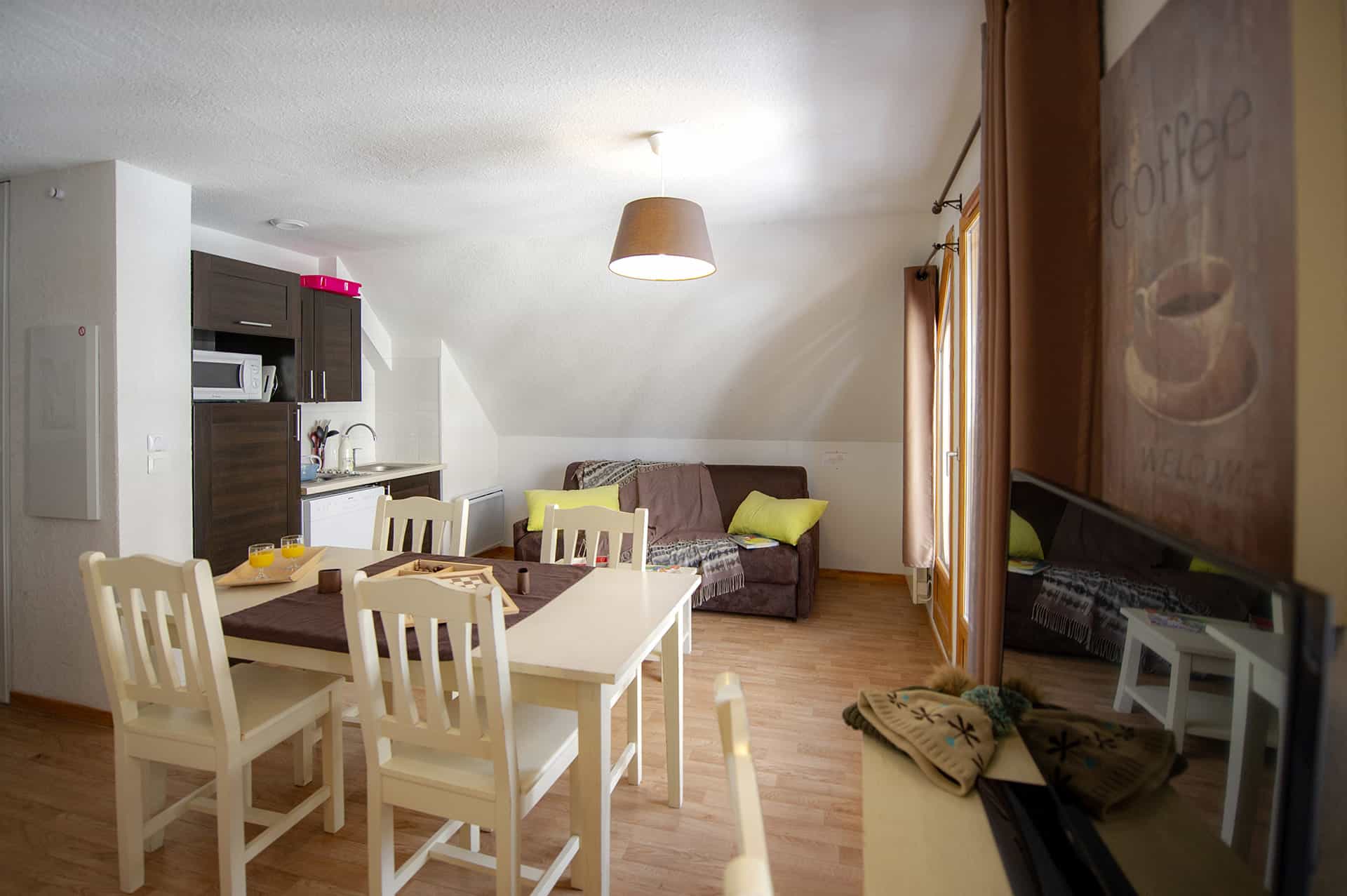 Example of living room of the residence of vacation Goélia Les Chalets de Super-Besse in the Massif Central Example of living room of the residence of vacation Goélia Les Chalets de Super-Besse in the Massif Central