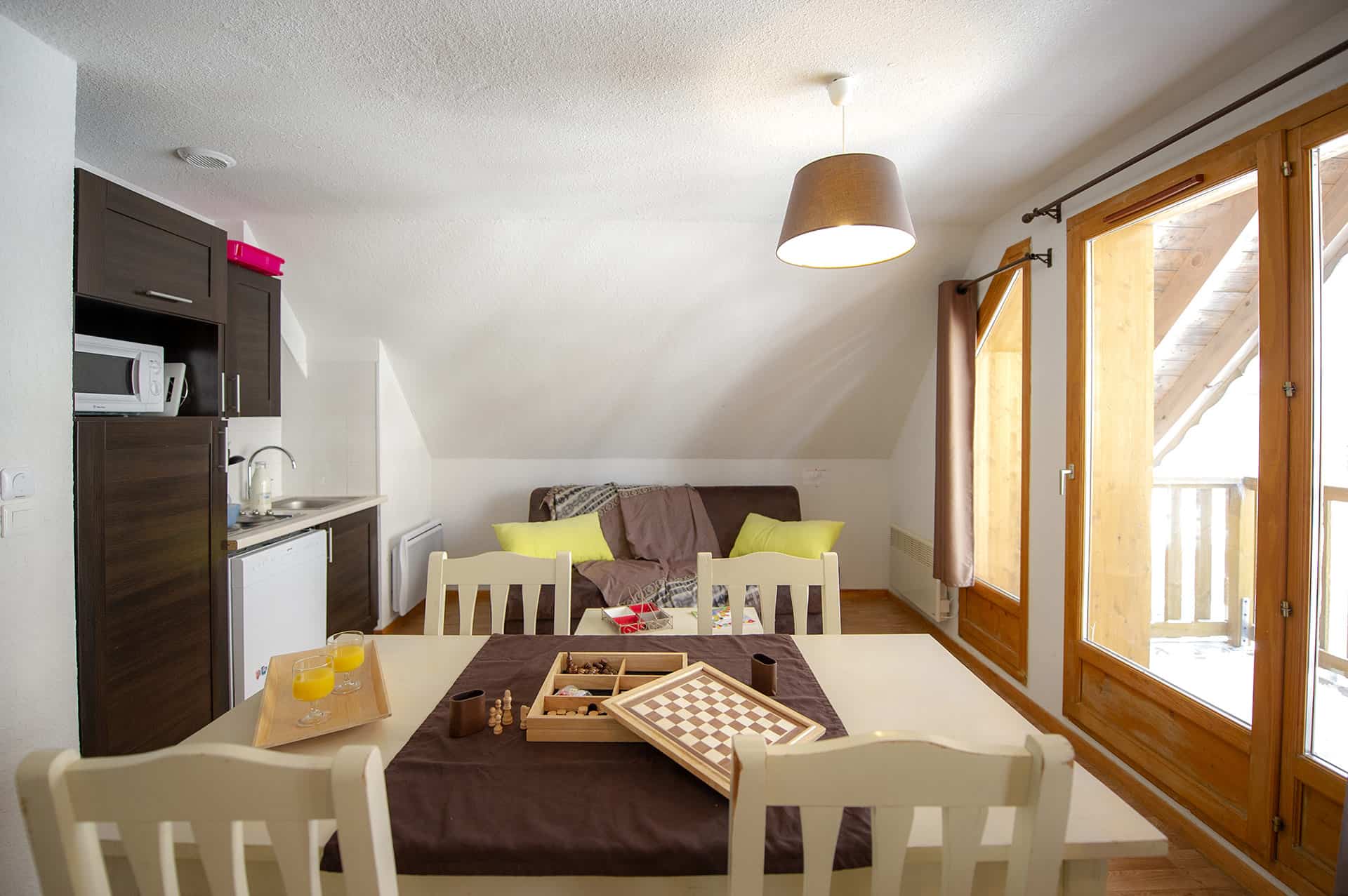 Example of living room of the residence of vacation Goélia Les Chalets de Super-Besse in the Massif Central Example of living room of the residence of vacation Goélia Les Chalets de Super-Besse in the Massif Central