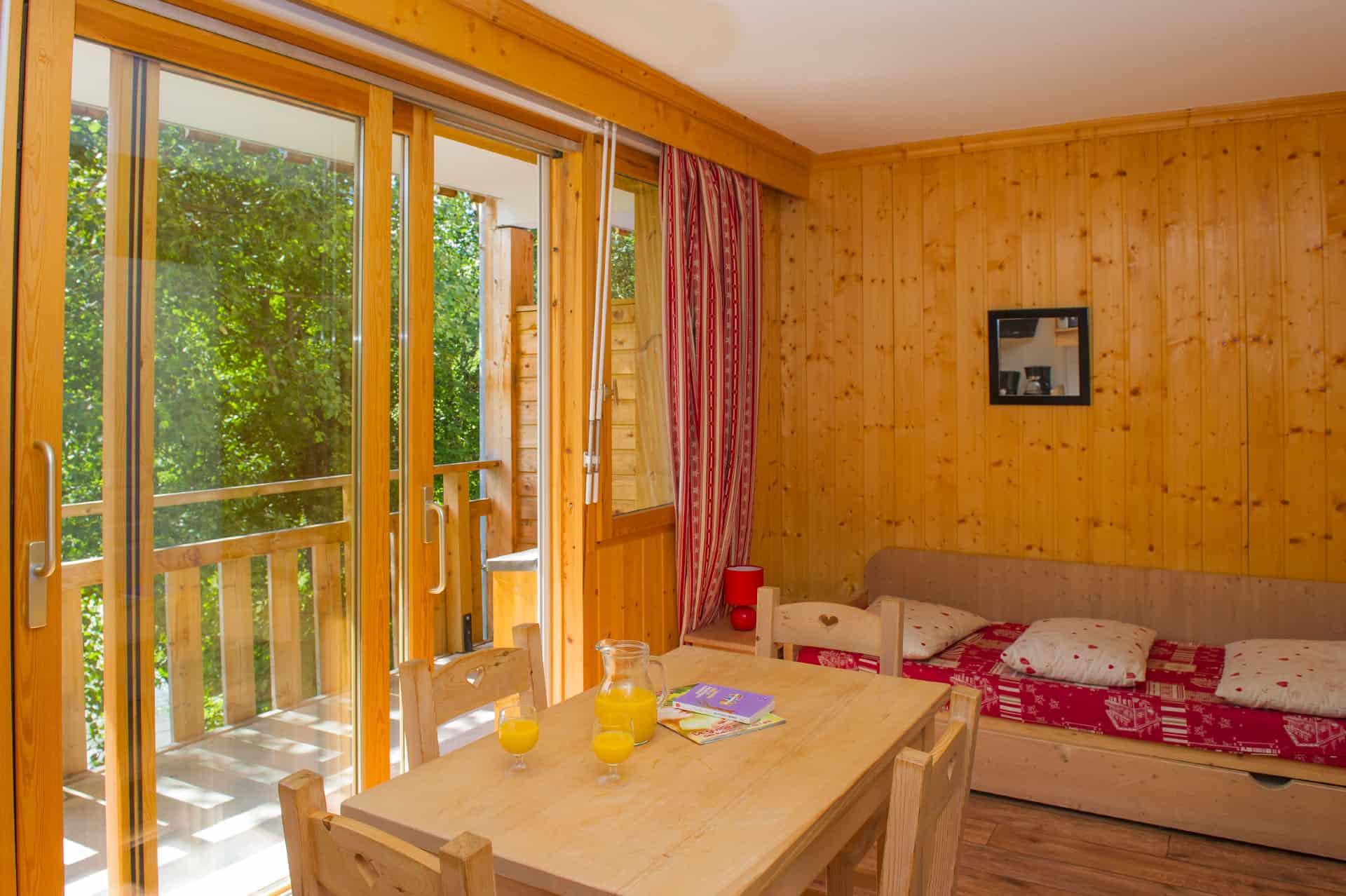 Example of a living room in the vacation residence Goélia Les Balcons des neiges in St Sorlin d'Arves in the Northern Alps Example of a living room in the vacation residence Goélia Les Balcons des neiges in St Sorlin d'Arves in the Northern Alps