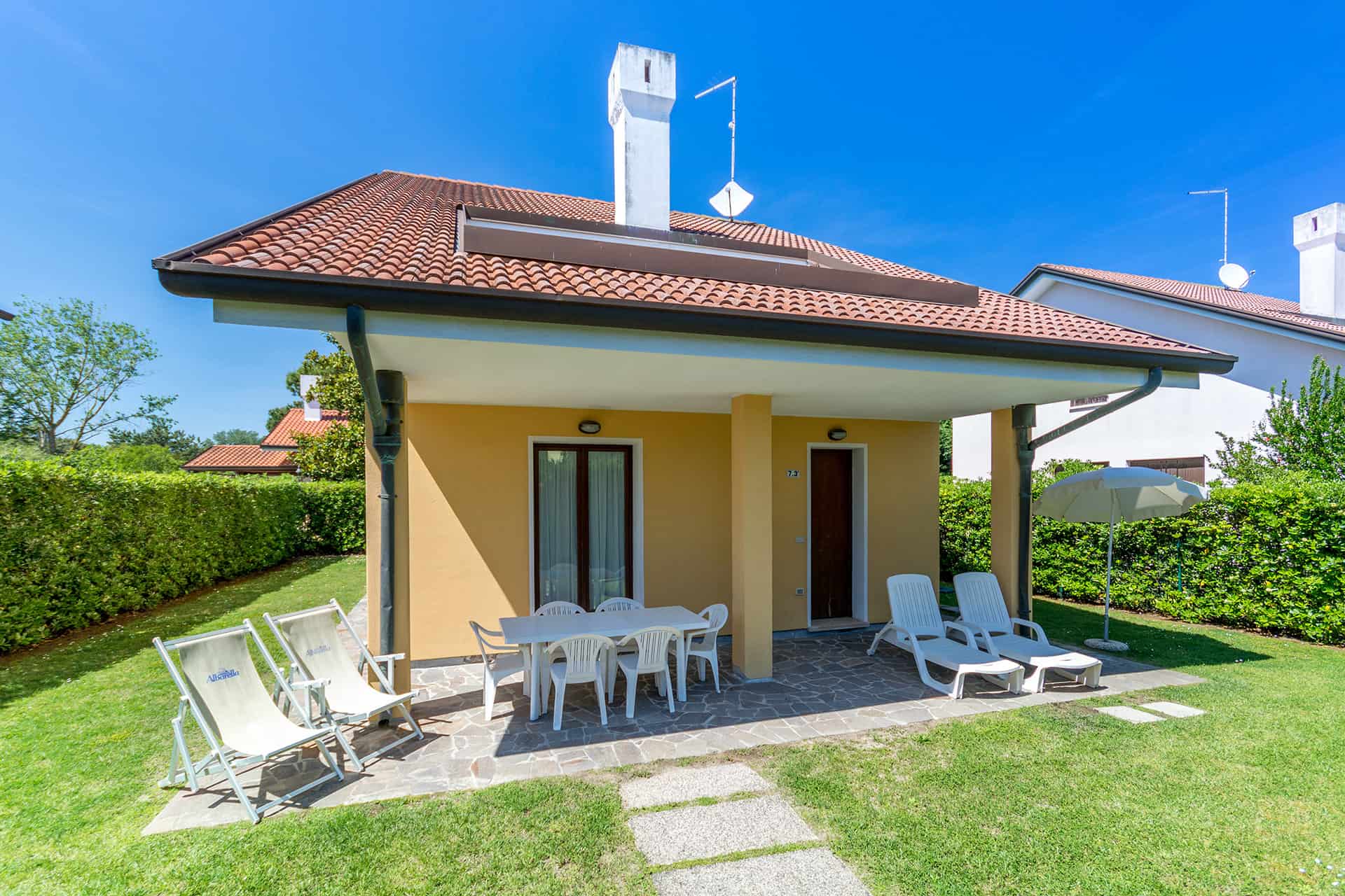 Extérieur d'un V4 dans la résidence vacances Albarella en Italie  Extérieur d'un V4 dans la résidence vacances Albarella en Italie