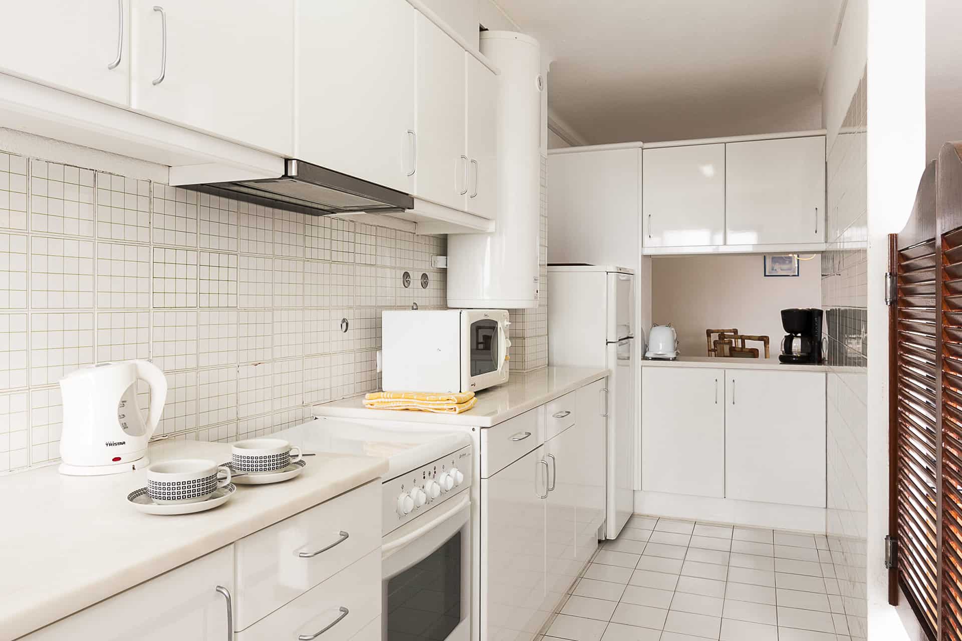 Exemple de cuisine de la résidence de vacances Apartamentos Do Parque à Albufeira, sur la côte de l'Algarve, au Portugal Exemple de cuisine de la résidence de vacances Apartamentos Do Parque à Albufeira, sur la côte de l'Algarve, au Portugal