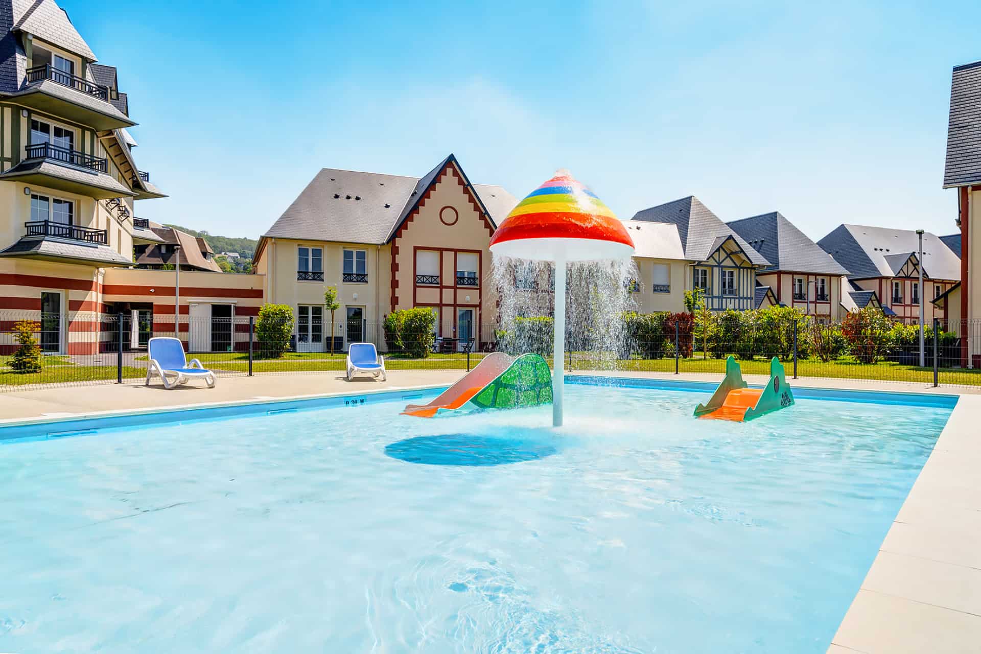 Outdoor, fun, heated children's pool at the Goélia Tourist Residence in Blonville-sur-Mer