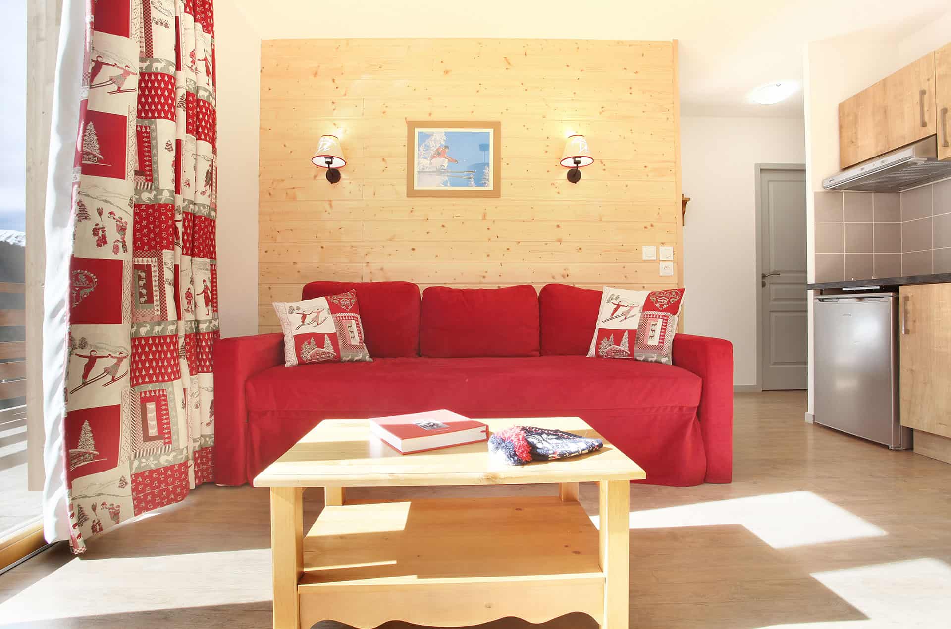 Exemple de salon d'un appartement de la résidence de vacances Goélia Le Crystal à Vaujany Exemple de salon d'un appartement de la résidence de vacances Goélia Le Crystal à Vaujany