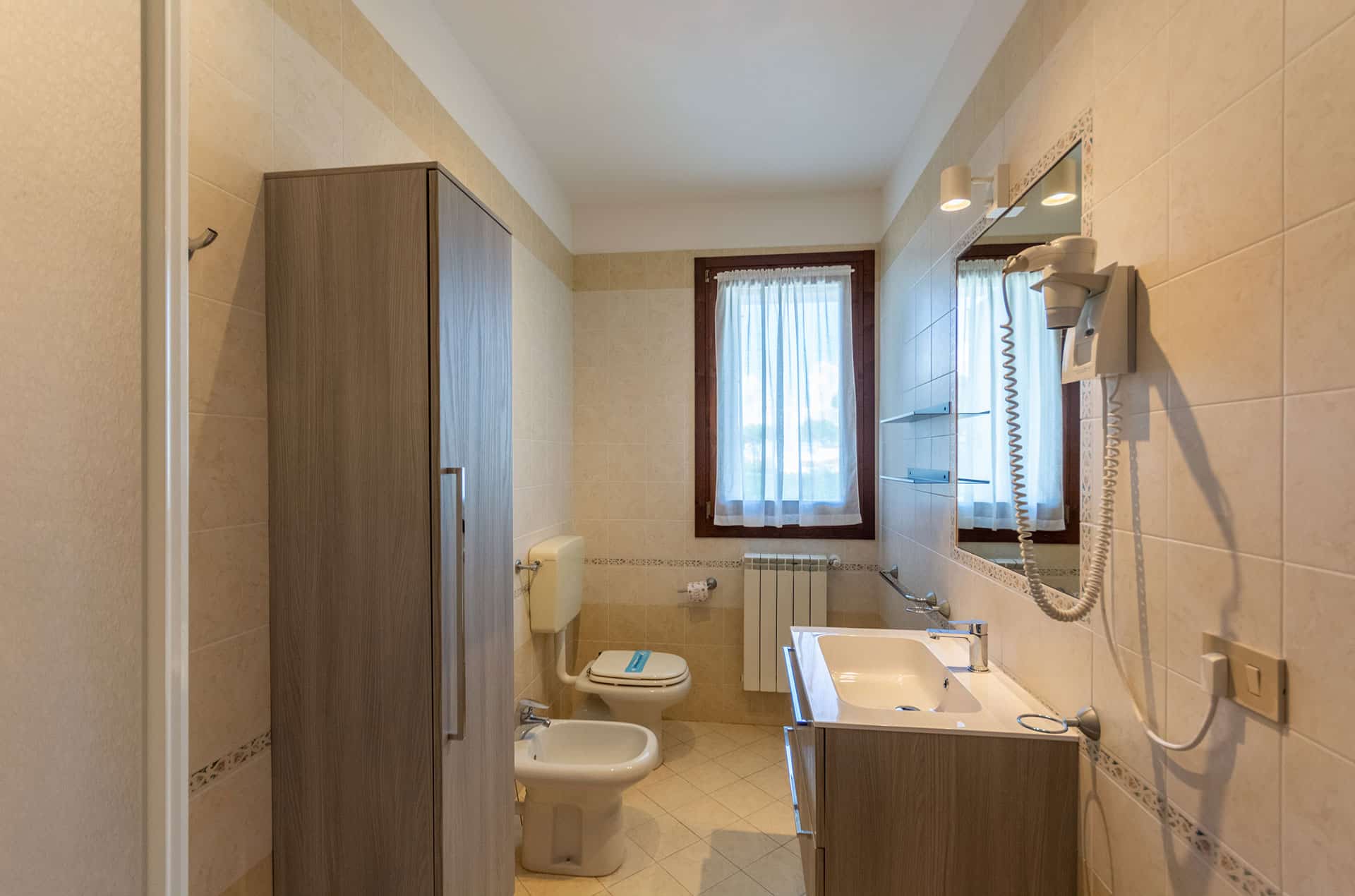 Exemple de salle de bain d'un V3 de la résidence de vacances Albarella en Italie Exemple de salle de bain d'un V3 de la résidence de vacances Albarella en Italie