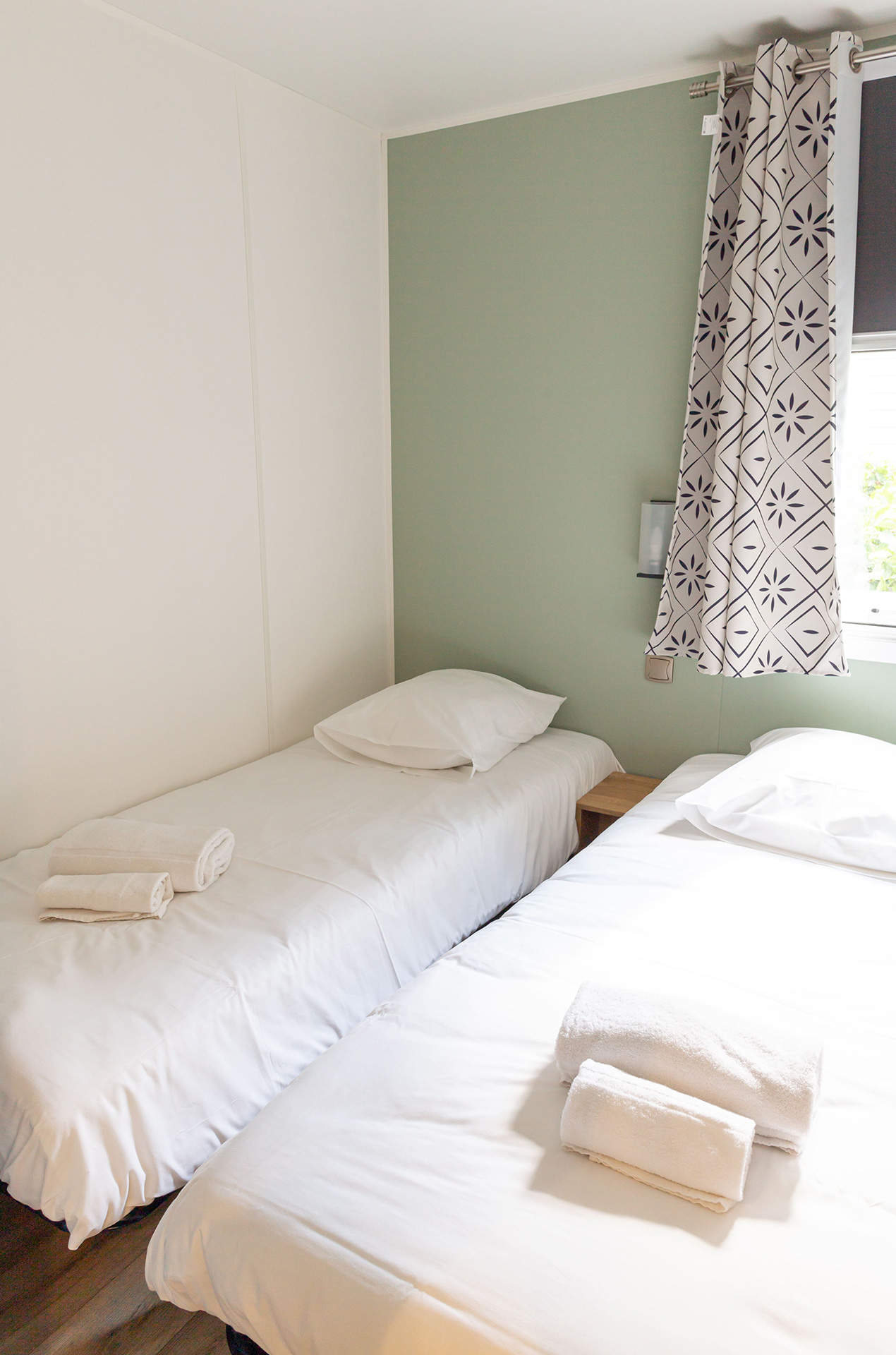 Exemple de chambre d'un logement prestige escapade de la résidence de vacances L'orangerie de Lanniron proche de Quimper Exemple de chambre d'un logement prestige escapade de la résidence de vacances L'orangerie de Lanniron proche de Quimper