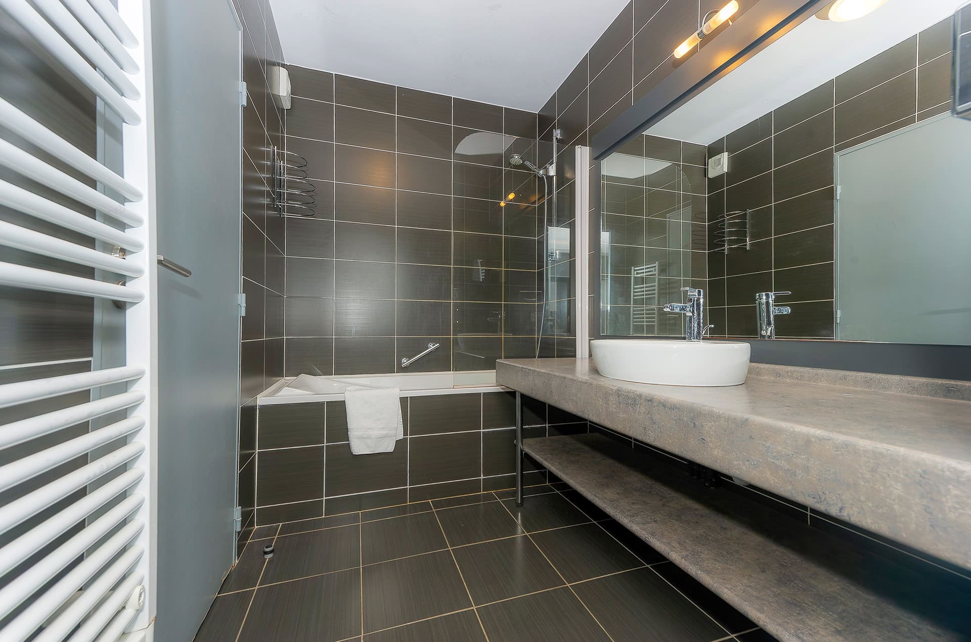 Exemple de salle d'une maison 3 pièces pour 6 personnes de la résidence de vacances Goélia Le Domaine de Pont-Aven à Pont-Aven en Bretagne sud Exemple de salle d'une maison 3 pièces pour 6 personnes de la résidence de vacances Goélia Le Domaine de Pont-Aven à Pont-Aven en Bretagne sud